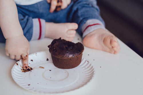 child eating cake