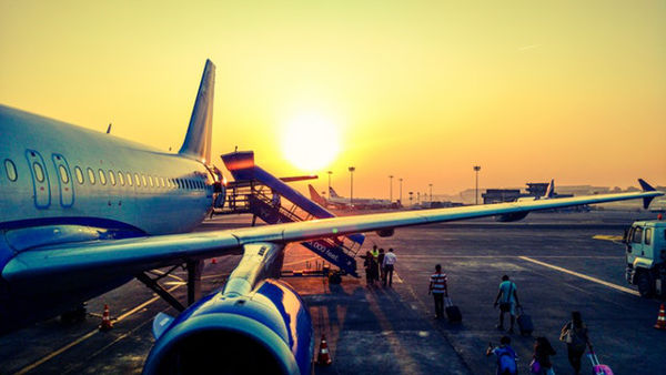 plane runway passengers car seat baby