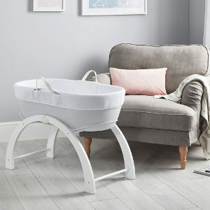 Shnuggle Dreami Moses Basket and Curve Rocking Stand in use