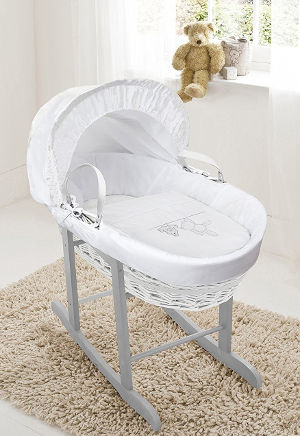 white teddy moses basket and rocking stand